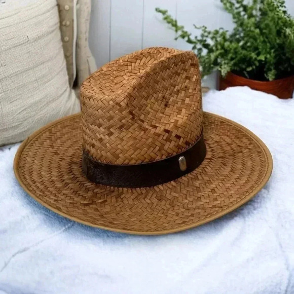 Western straw and leather cowboy hat